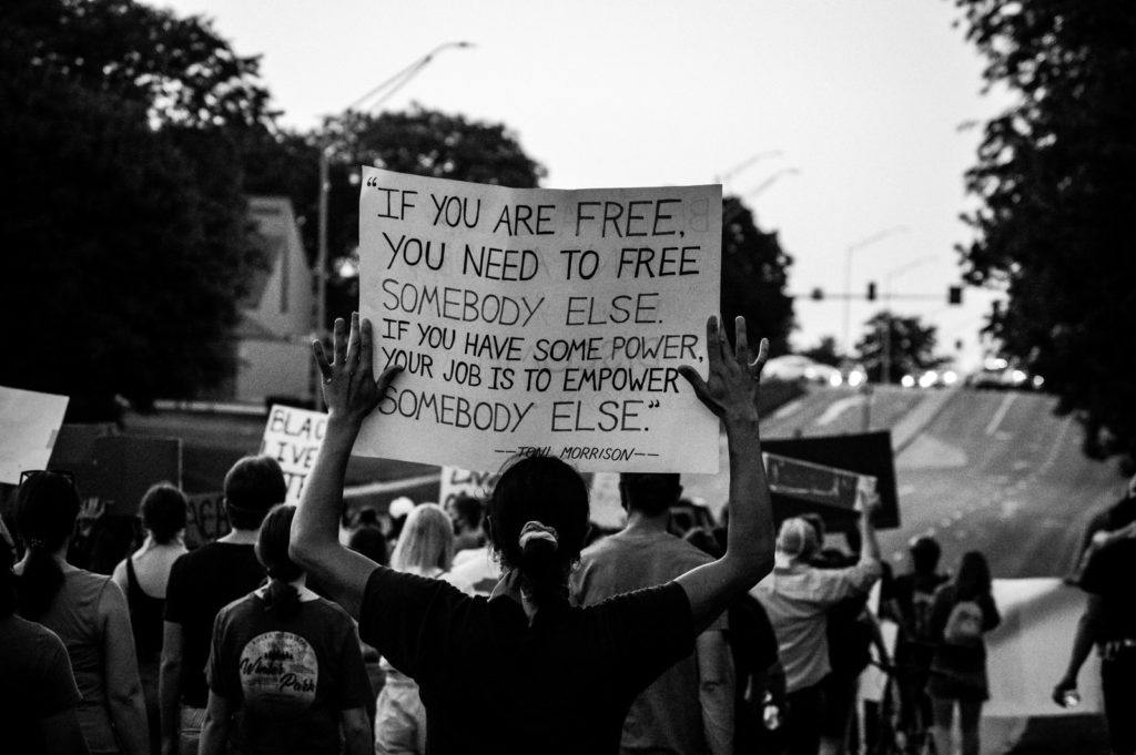 grayscale photo of protestors